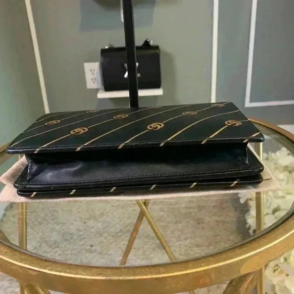 Gucci mini leather chain bag with double G stripe in black and gold. - Picture 7 of 14